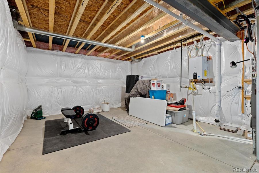 In-progress construction of a new home in Looking Glass, Parker, CO (Image 38).