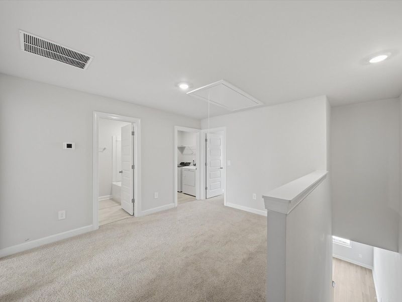 Spacious, unfurnished interior of a new home in Crossing at Abner Creek Townes, Greer (Image 15).