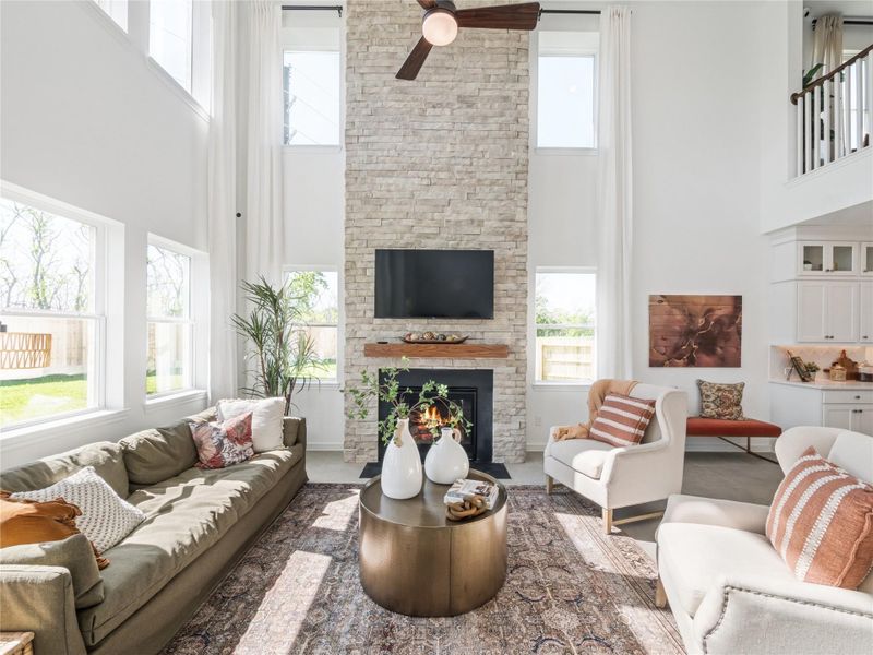 Impressive great room with cozy fireplace (*Photo not of actual home and used for illustration purposes only.) Impressive great room with cozy fireplace (*Photo not of actual home and used for illustration purposes only.)