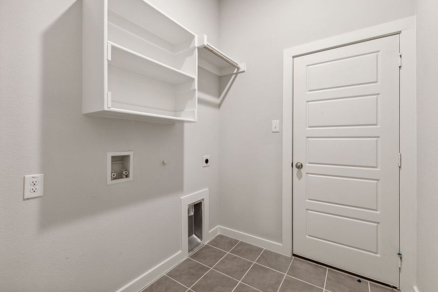 Utility Room in the Cedar home plan by Trophy Signature Homes – REPRESENTATIVE PHOTO