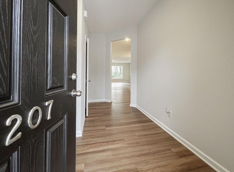 Spacious, unfurnished interior of a new home in East Main Townes, Spartanburg (Image 12).