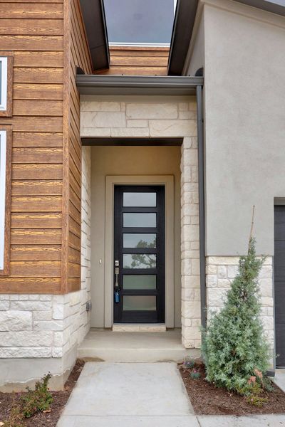 Exterior details and patio area of a home in Caliterra, Dripping Springs (Image 3).