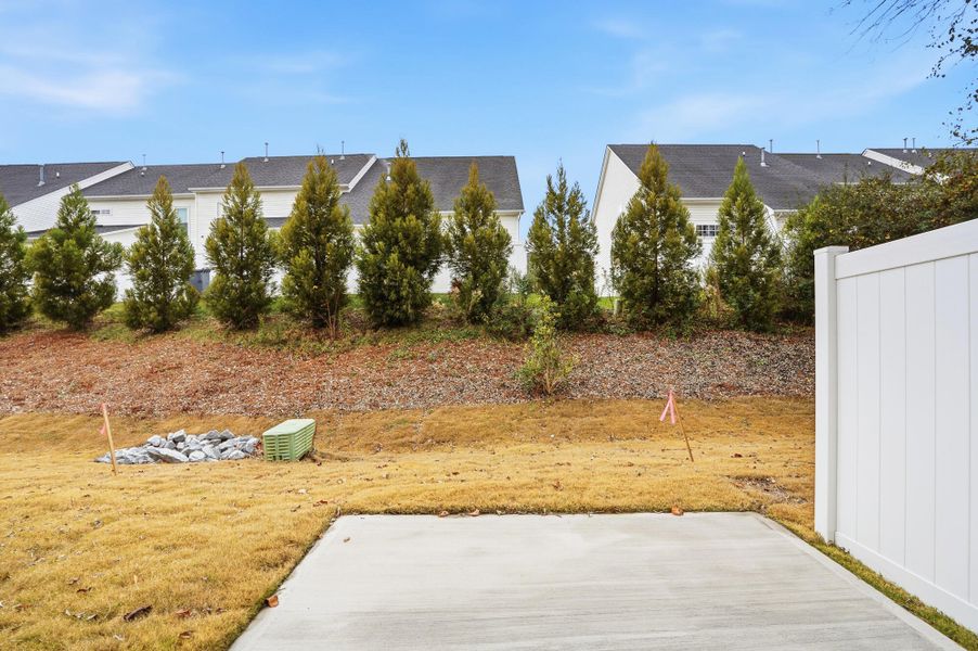 Exterior details and patio area of a home in Harrisburg Village Townhomes, Harrisburg (Image 4).
