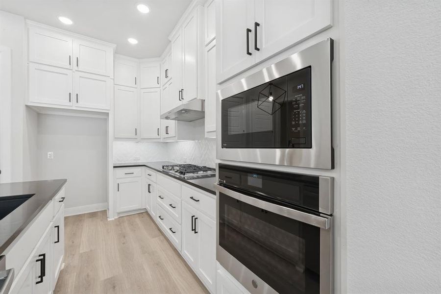 Furnished interior view inside a new home in Hillside at Las Colinas, Irving (Image 10). Furnished interior view inside a new home in Hillside at Las Colinas, Irving (Image 10).