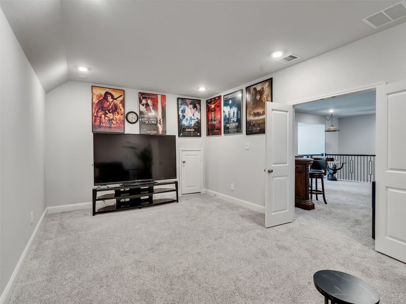Furnished interior view inside a new home in ARTAVIA, Conroe (Image 33).