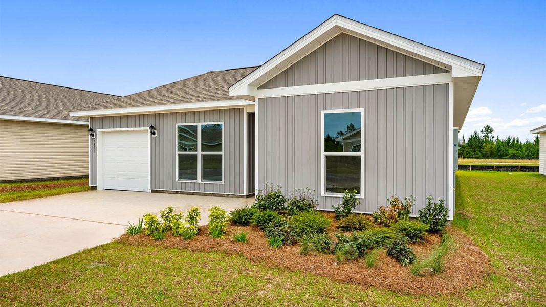 Front exterior of a new home in Liberty, Panama City, FL, highlighting curb appeal (Image 2). Front exterior of a new home in Liberty, Panama City, FL, highlighting curb appeal (Image 2).