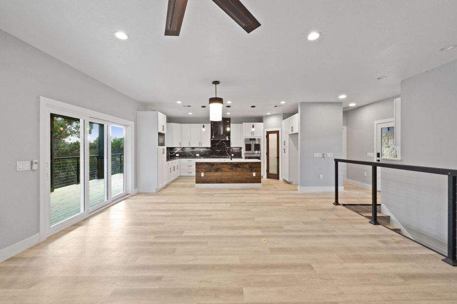 Stacking sliding doors open the living space to the large covered porch.