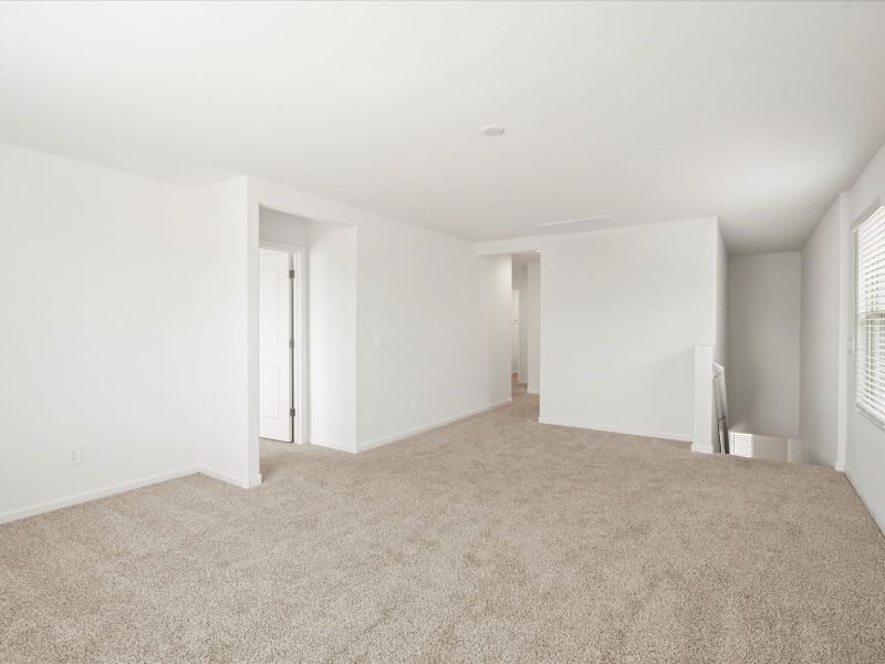 Spacious, unfurnished interior of a new home in Mandarina - Signature Series, Marana (Image 12).