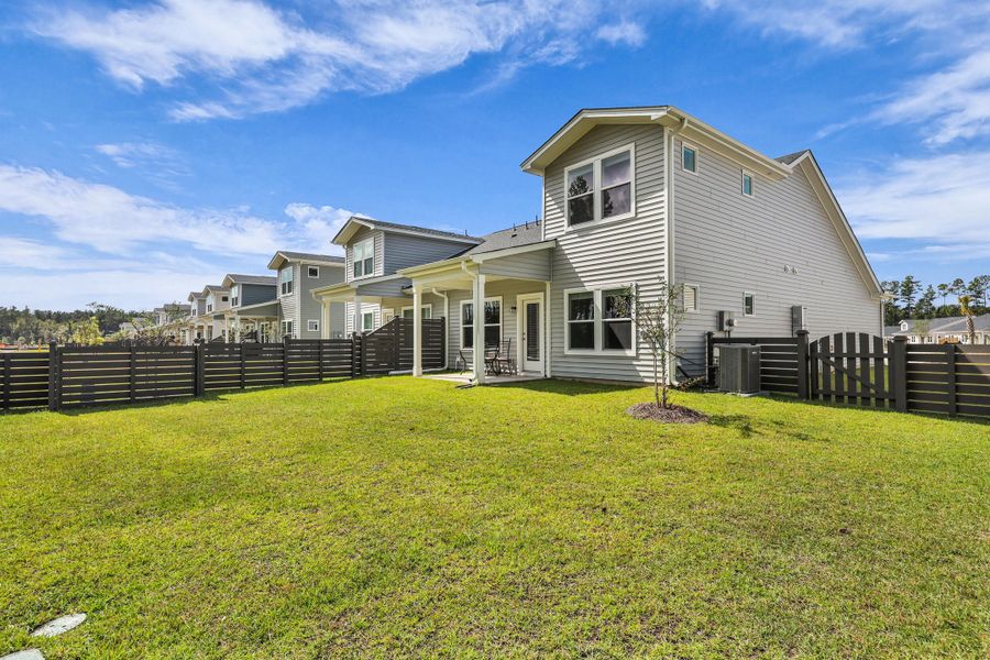 Exterior details and patio area of a home in Hammock Walk at Nexton, Summerville (Image 25). Exterior details and patio area of a home in Hammock Walk at Nexton, Summerville (Image 25).