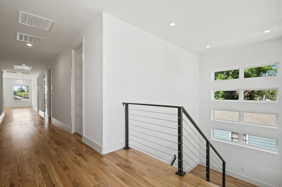 Hallway featuring wood-type flooring