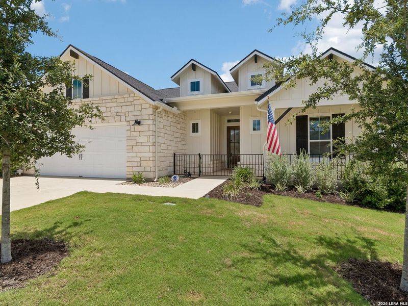Front exterior of a new home in Kissing Tree, San Marcos, TX, highlighting curb appeal (Image 25). Front exterior of a new home in Kissing Tree, San Marcos, TX, highlighting curb appeal (Image 25).