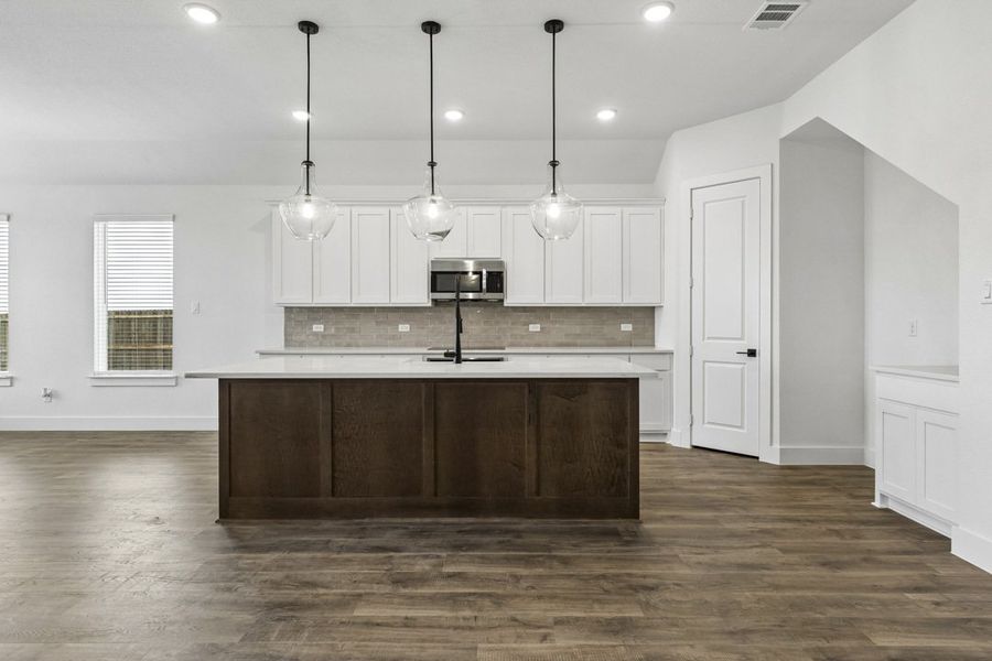 Furnished interior view inside a new home in Brahman Ranch, Venus (Image 9).
