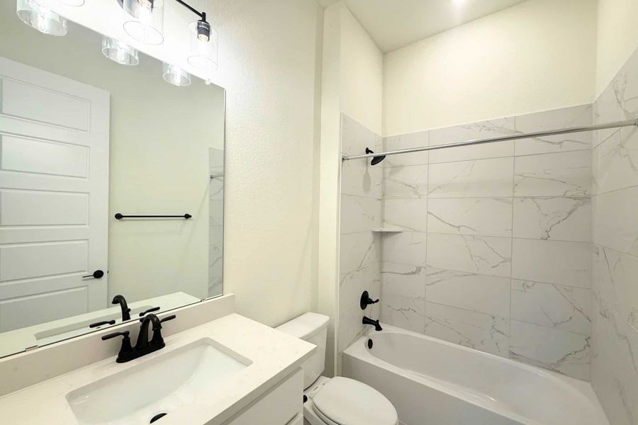Furnished interior view inside a new home in Heights at San Gabriel, Georgetown (Image 13).