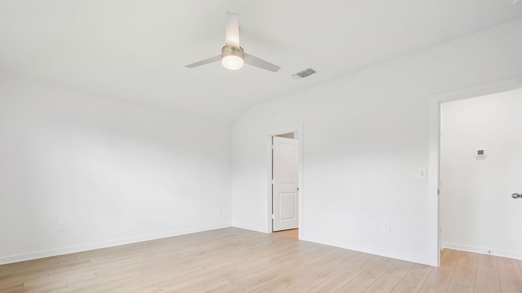 Spacious, unfurnished interior of a new home in Trails at Wildhorse, Austin (Image 25).