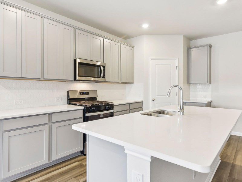 Photo is not of the actual home, but is an inspirational photo of builder’s model home and may depict options, furnishings, and/or decorator features that are not included