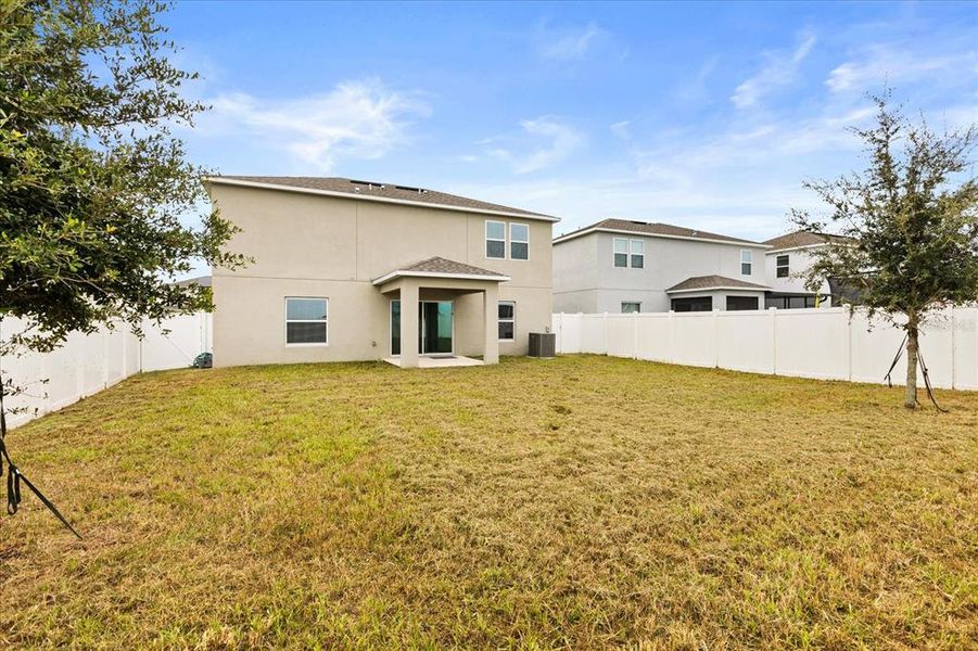 Exterior details and patio area of a home in Parkside at Cherry Lake, Groveland (Image 18). Exterior details and patio area of a home in Parkside at Cherry Lake, Groveland (Image 18).