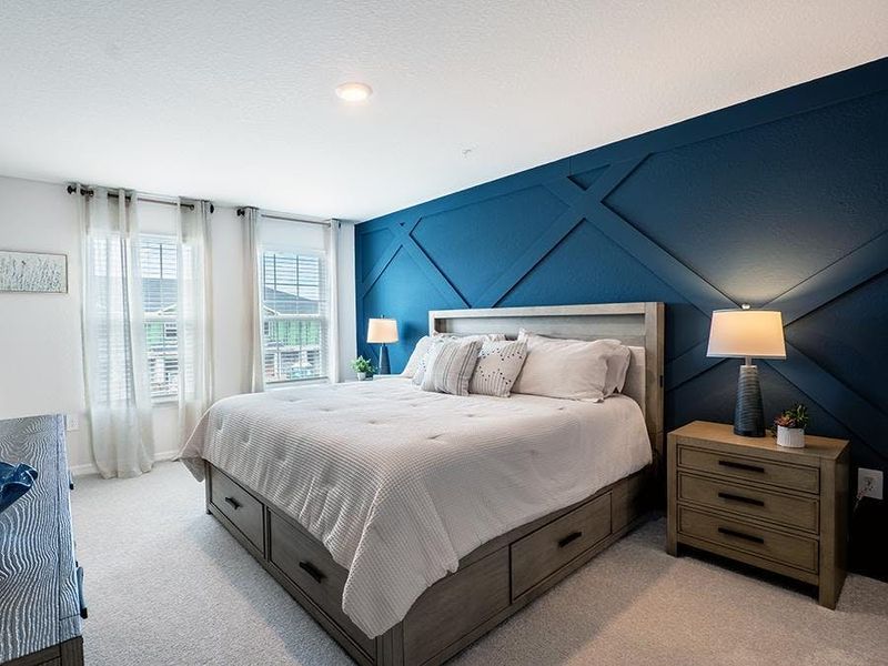 Upstairs, find rest and relaxation in your private owner`s suite - Azalea townhome by Highland Homes