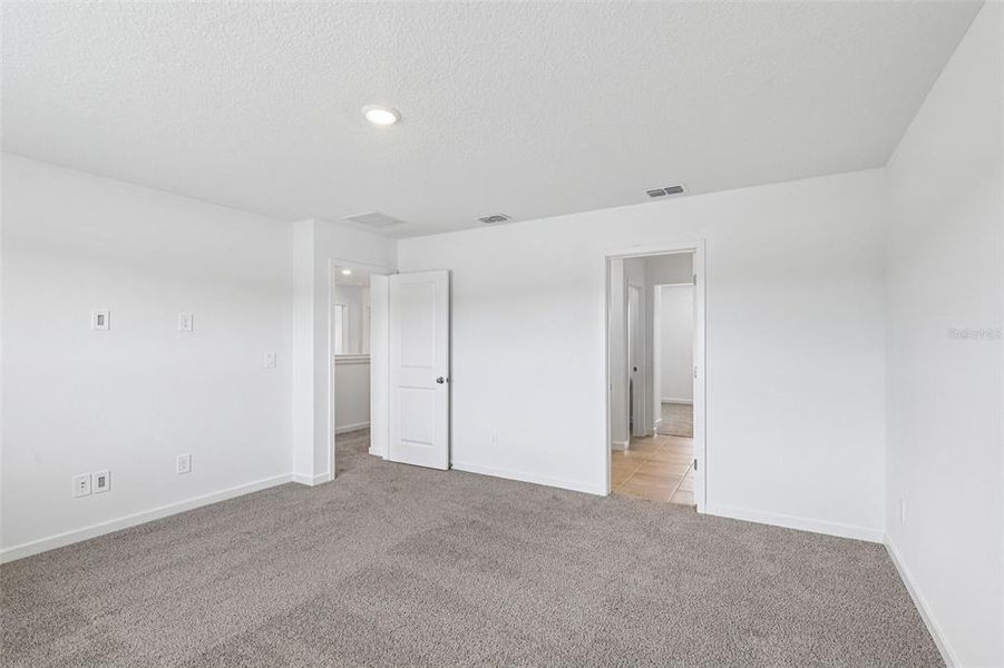 Spacious, unfurnished interior of a new home in Flagler Village - Signature Series, Palm Coast (Image 25). Spacious, unfurnished interior of a new home in Flagler Village - Signature Series, Palm Coast (Image 25).
