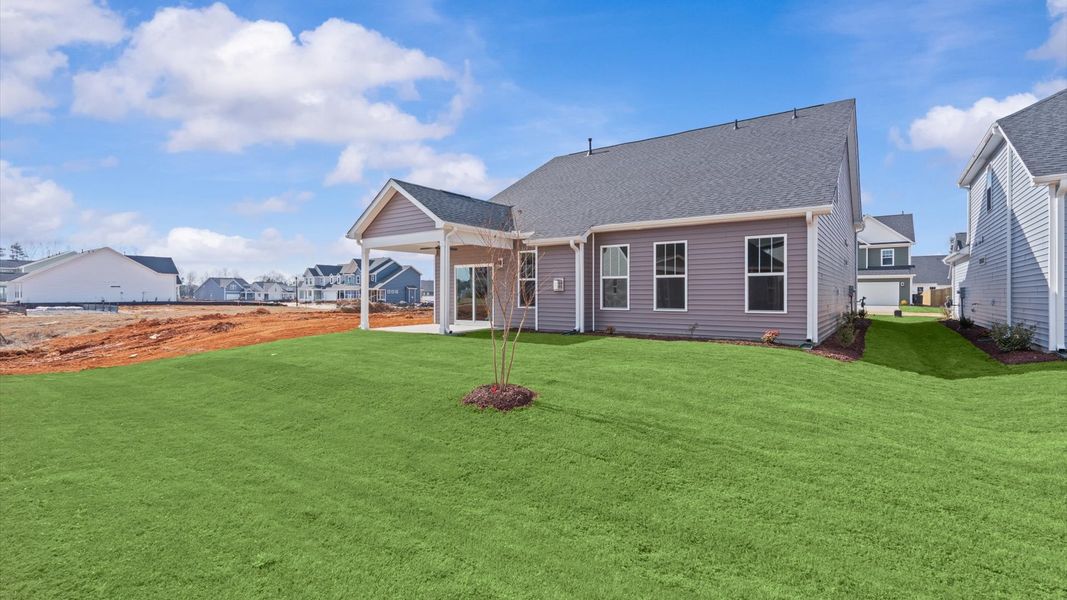 Established charm meets functional outdoor living with a spacious rear covered porch