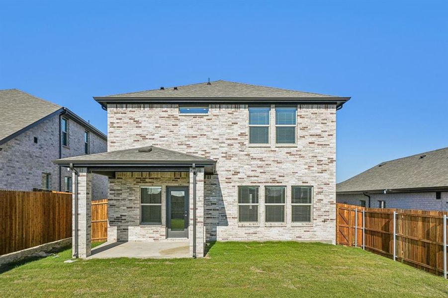 Exterior details and patio area of a home in Eastridge - Spring Series, McKinney (Image 3).