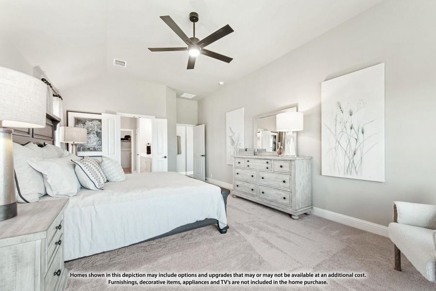 Master bedroom with vaulted ceiling, ceiling fan, carpet flooring, and dresser with mirror Master bedroom with vaulted ceiling, ceiling fan, carpet flooring, and dresser with mirror