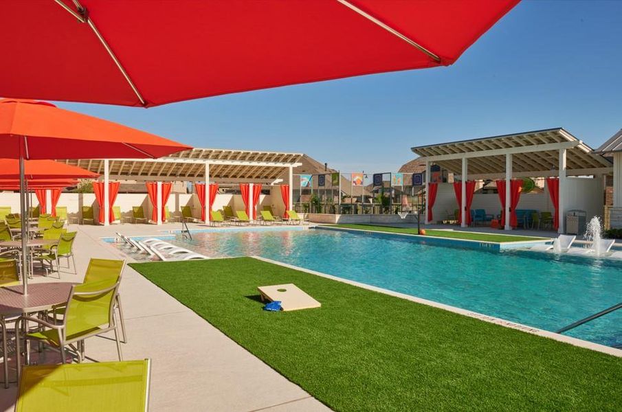 Community pool with a patio area, a pergola, and a yard