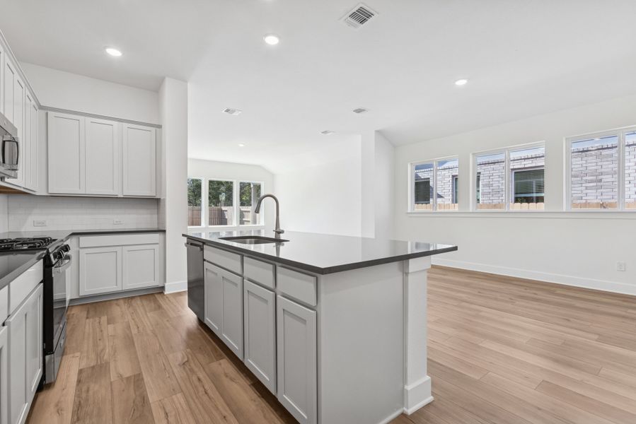 Furnished interior view inside a new home in The Colony, Bastrop (Image 6).