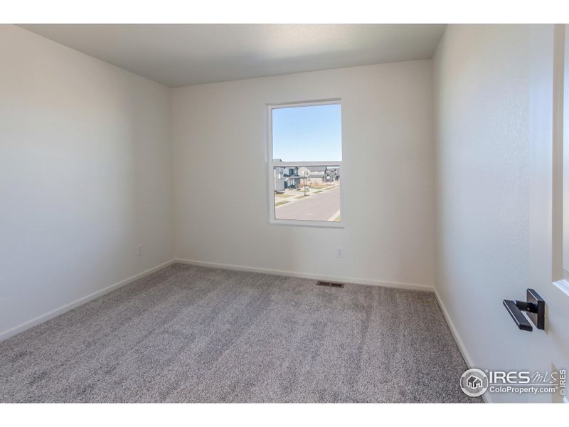 Spacious, unfurnished interior of a new home in Trailside Story Collection - Single Family Homes, Timnath (Image 15).