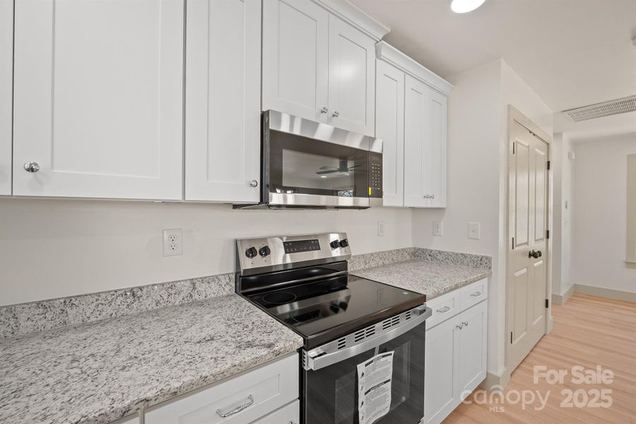 Furnished interior view inside a new home in , Newton (Image 8).