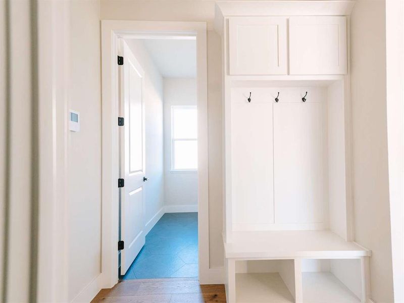 Mudroom featuring light hardwood / wood-style flooring