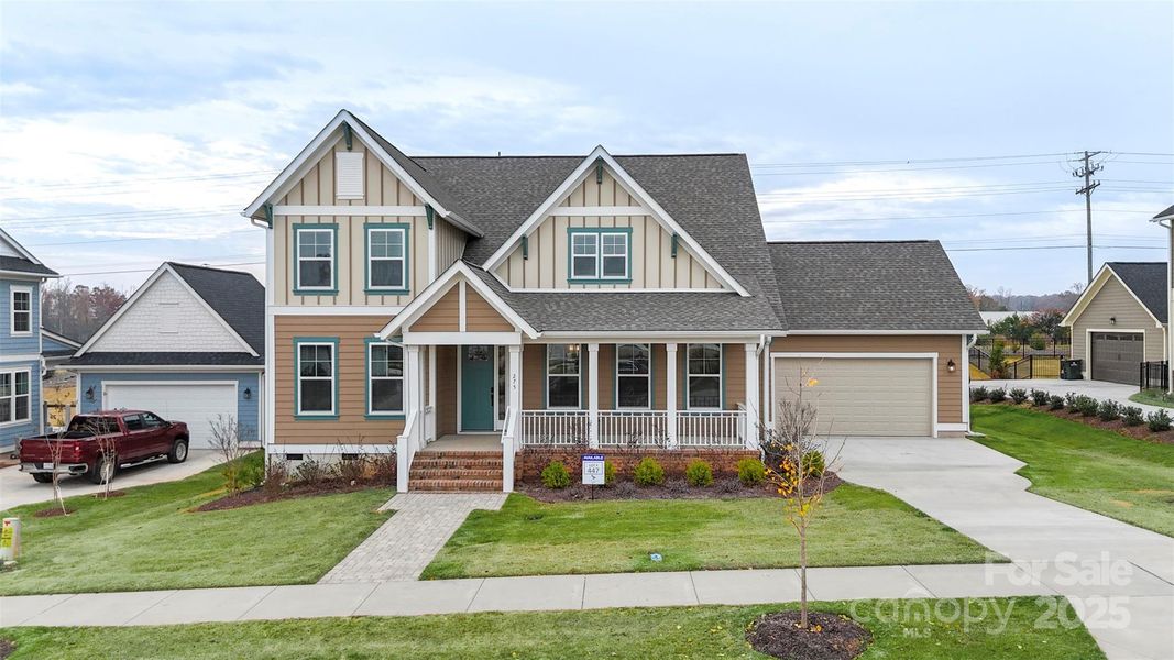 Front exterior of a new home in Riverwalk, Rock Hill, SC, highlighting curb appeal (Image 23).