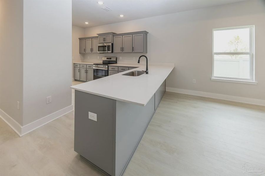 Furnished interior view inside a new home in Parkland Place, Pace (Image 9).