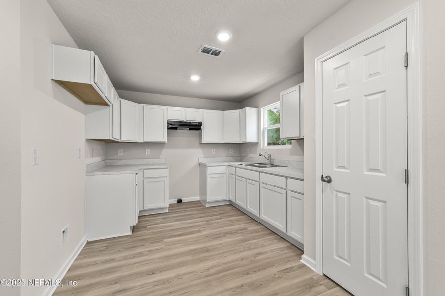 Furnished interior view inside a new home in , Jacksonville (Image 7).