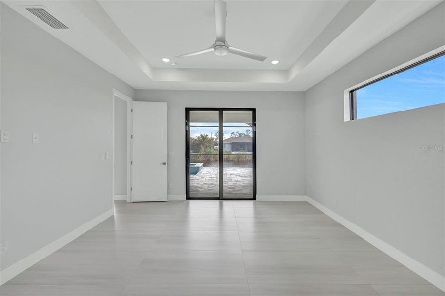 Spacious, unfurnished interior of a new home in , Port Charlotte (Image 24).