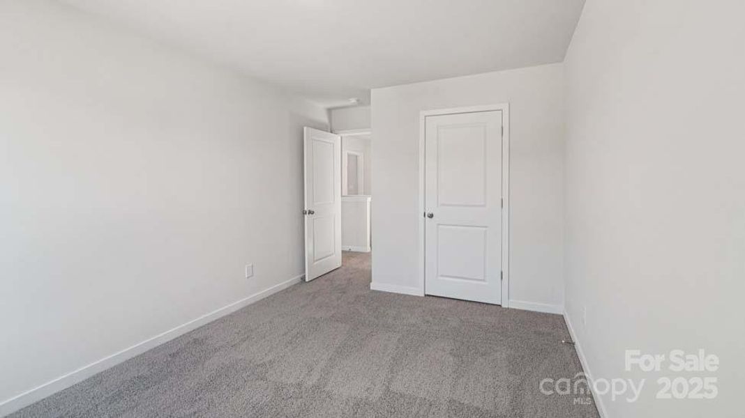 Spacious, unfurnished interior of a new home in Cardinal Creek, Charlotte (Image 12).