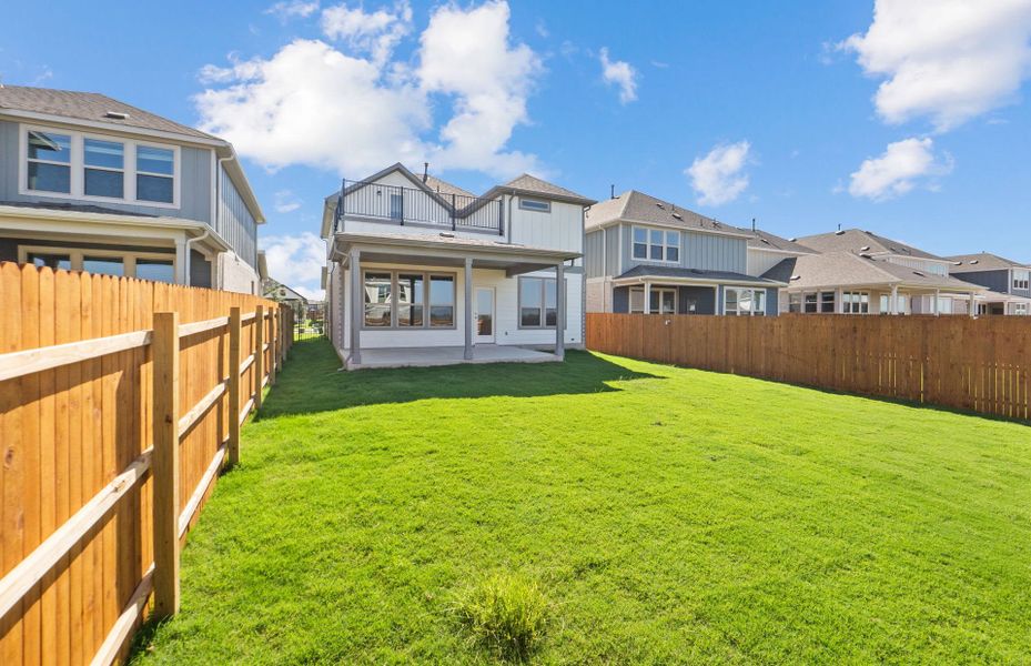 Exterior details and patio area of a home in Santa Rita Ranch, Liberty Hill (Image 24). Exterior details and patio area of a home in Santa Rita Ranch, Liberty Hill (Image 24).