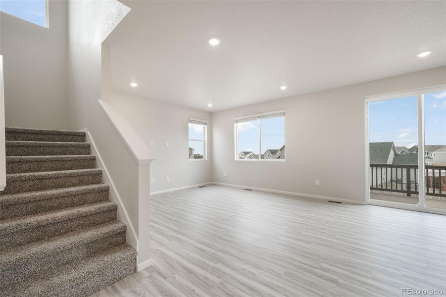View to upstairs and living room