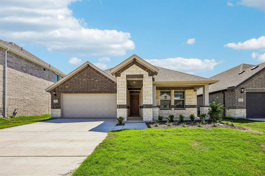 Front exterior of a new home in Stella Hills, Denton, TX, highlighting curb appeal (Image 27).