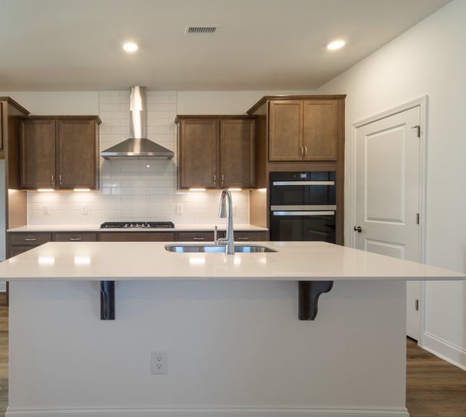 Representative furnished interior of a home built from the Camellia by McKee Homes in The Walk at East Village, Clayton (Image 3). Representative furnished interior of a home built from the Camellia by McKee Homes in The Walk at East Village, Clayton (Image 3).