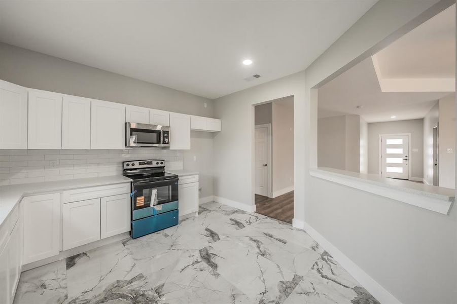 Furnished interior view inside a new home in , Greenville (Image 7).