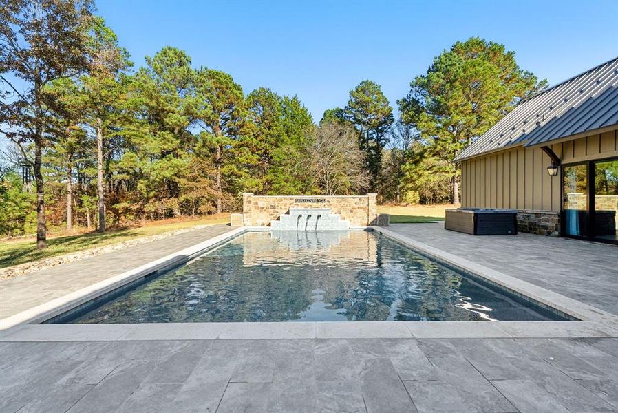 Outdoor pool with a patio area