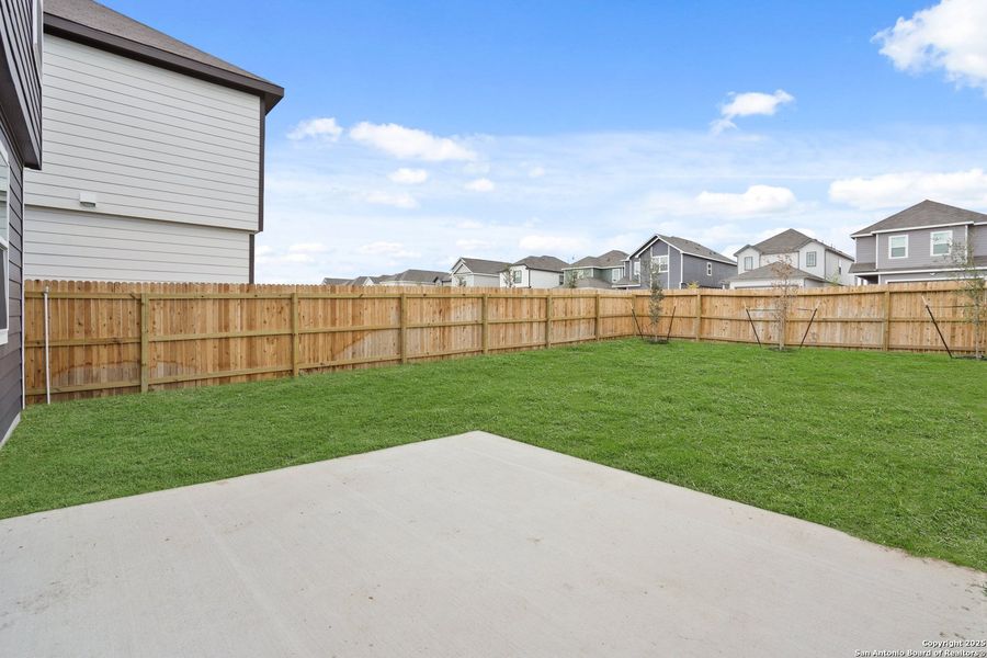 Exterior details and patio area of a home in Melissa Ranch, San Antonio (Image 18). Exterior details and patio area of a home in Melissa Ranch, San Antonio (Image 18).