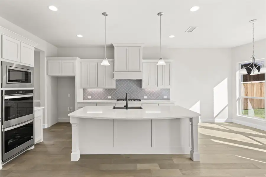 Representative furnished interior of a home built from the Portsmouth by Windsor Homes in Nelson Lake Estates, Rockwall (Image 8).