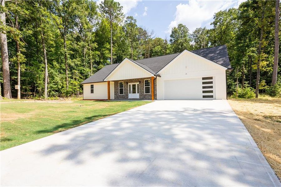 Front exterior of a new home in , Rome, GA, highlighting curb appeal (Image 1). Front exterior of a new home in , Rome, GA, highlighting curb appeal (Image 1).