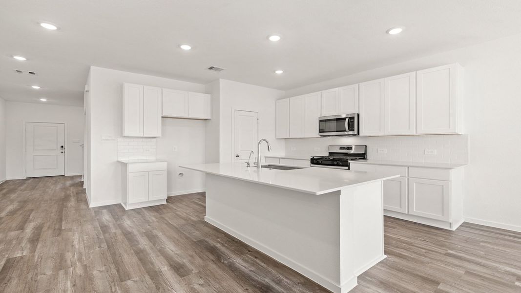 Furnished interior view inside a new home in Sunterra, Katy (Image 5).