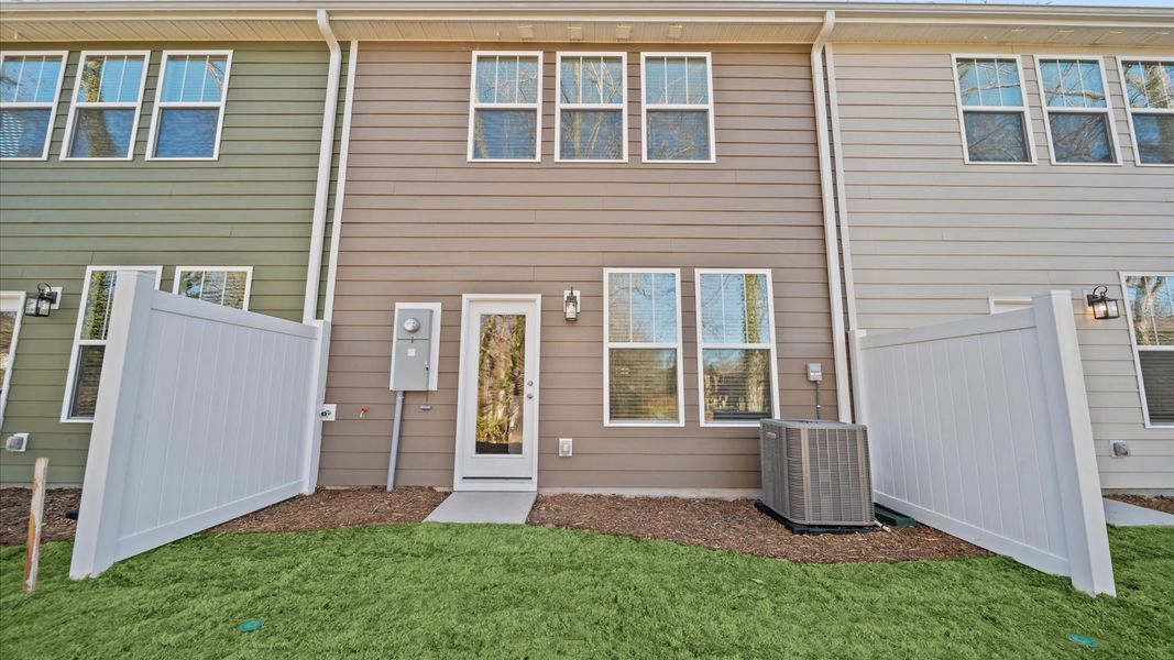 Exterior details and patio area of a home in Clayton Crossing, Arden (Image 4).