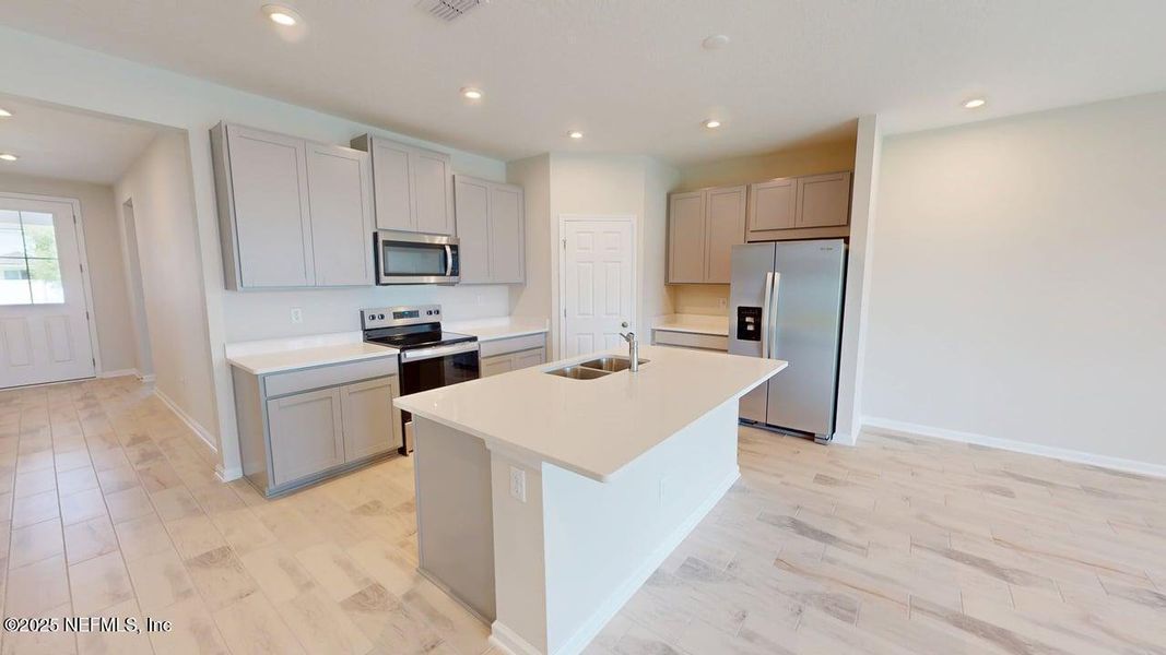 Furnished interior view inside a new home in Sandridge Hills, Green Cove Springs (Image 5).