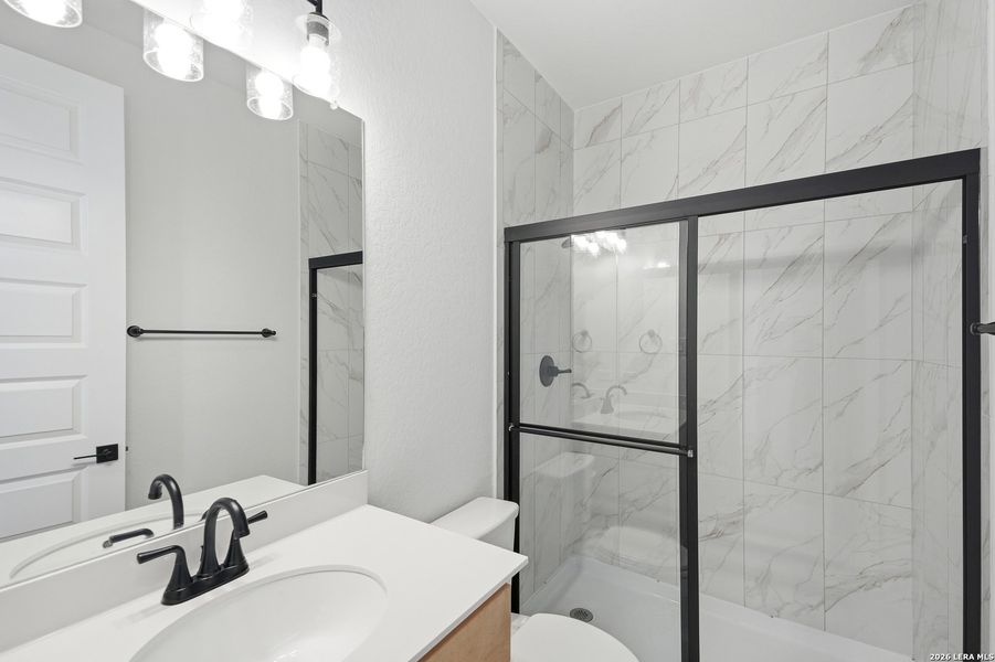 Furnished interior view inside a new home in The Reserve at Potranco Oaks, Castroville (Image 9).