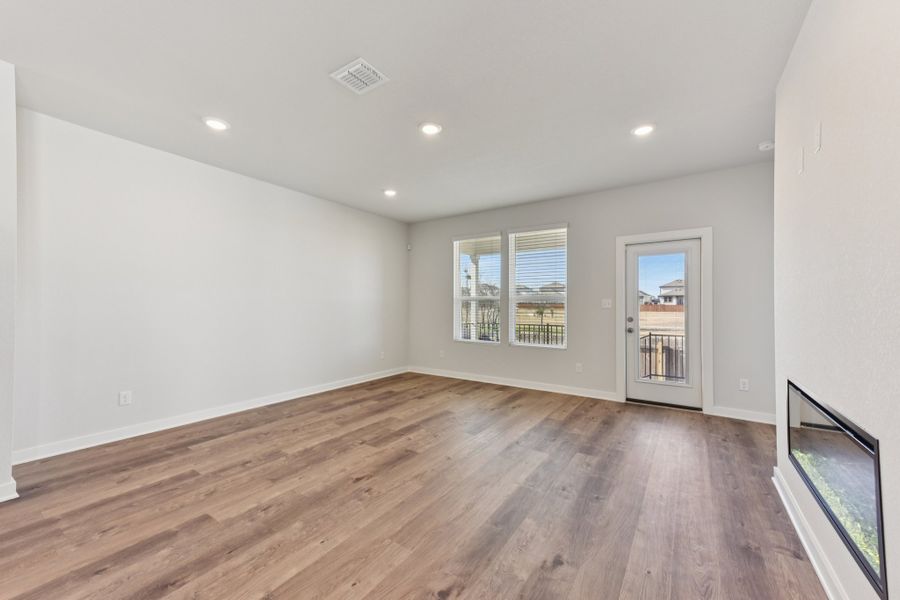 A room with a wood floor and a wood floor. A room with a wood floor and a wood floor.
