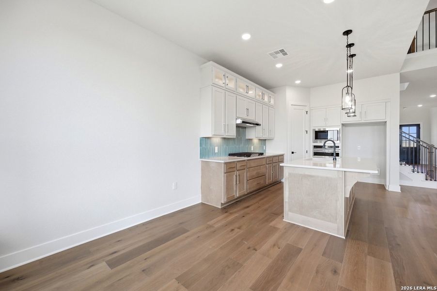 Furnished interior view inside a new home in VIDA, San Antonio (Image 9).